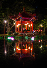 Chinese pavilion in Lazienki Krolewskie Park in Warsaw at night - 109371099