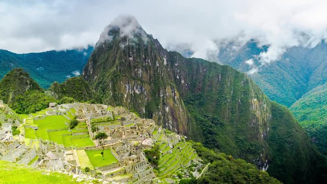 Time lapse of tourists in Machu Picchu and the clouds at the mountain, Cusco, Peru