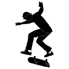 Young man riding a skateboard in black