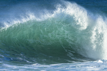 Fototapeta na wymiar Wave crashing water