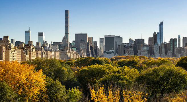 Fall in Central Park with Midtown skyscapers and high-rise buildings of the Upper East Side. New York City