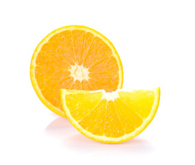 Orange cut pieces on white background.