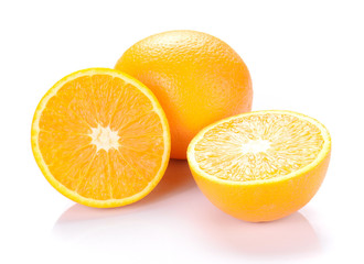 Orange cut pieces on white background.