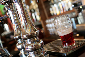 Chrome beer taps with highlights in the pub - obrazy, fototapety, plakaty