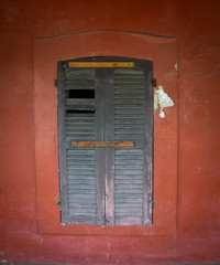 Antique wooden window of the  red building at chanthaburi, Thail