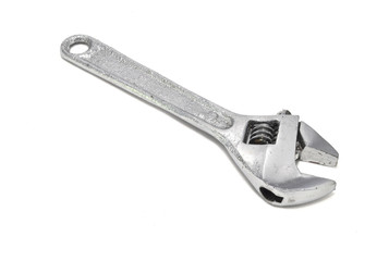 Гаечный ключ на белом фоне крупным планом