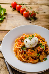 Italian pasta with poached egg
