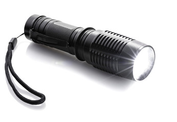 luminous black flashlight - obrazy, fototapety, plakaty