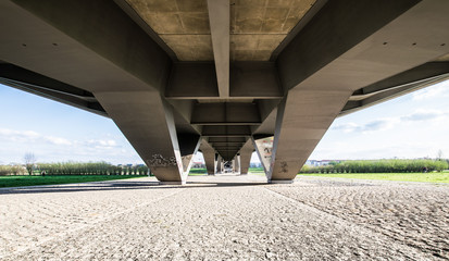 Beneath a bridge