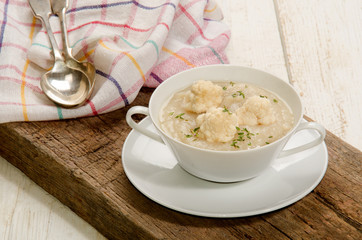 cauliflower soup with thyme in a bowl