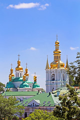 Fototapeta na wymiar Bell Tower of Distant Caves and Church of Birth Blessed Virgin Holy Assumption of Kiev Pechrsk Lavra monestary, Kyiv, Ukraine. Oldest Orthodox Monastery in Ukraine, dating from 1051