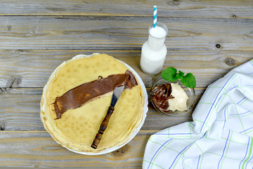 Pancakes on wooden table