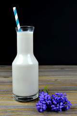 Milk bottle and striped straw