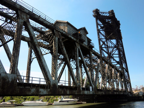 Rusty old industrial railroad lift bridge over Chicago canal - landscape color photo