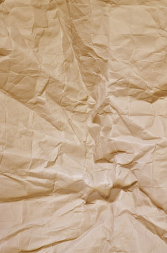 Hintergrund, ocker, zerkittertes Papier / Papier, ocker, zerknittert, Nahaufnahme, Detail, Format f&uuml;llend, vertikal