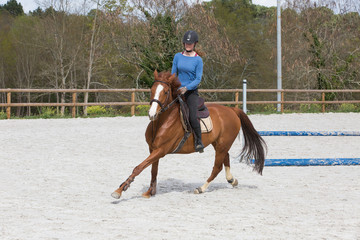 pretty woman riding horse