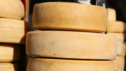 riped cheeses on sale in the food market