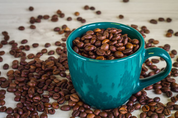 mug filled with coffee beans