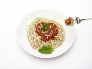 plate of spaghetti with tomato sauce
