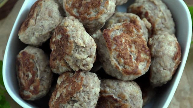 Portion of Mini Burgers as not seamless loopable 4K UHD footage