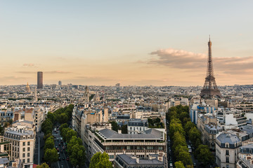 Fototapeta na wymiar Paris view from Arc de Triomphe de l'Etoile on Sunset. France.