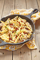Penne pasta with chicken and cream sauce