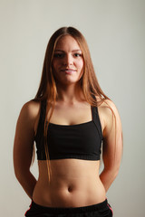 Fototapeta premium Happy young woman wear black sportswear.