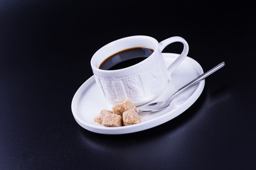 black coffee on a black background