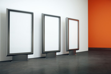 Three blank billboards