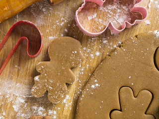 detailed shot of cookies cutter with cookie dough.