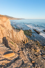 Rocky California Ocean Cliffs.  A rocky cliff view of the Pacific ocean at low tide in Carpinteria, California.