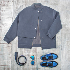 top view of fashion cloth, gray jacket and accessories