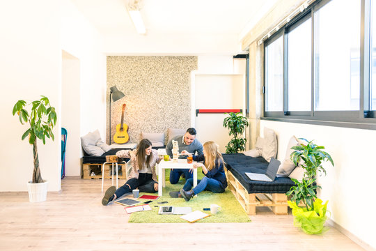 Group Of Young People Employee Workers Having A Business Break In Start Up Office Game Room