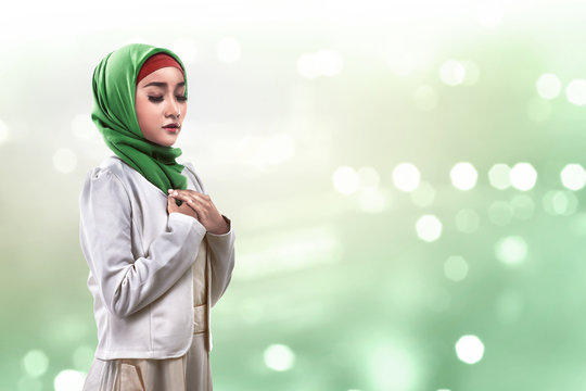 Asian muslim woman praying
