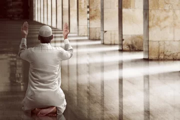 Fotobehang Religious muslim man praying © Leo Lintang