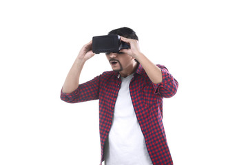 Asian man watching movie on virtual reality headset