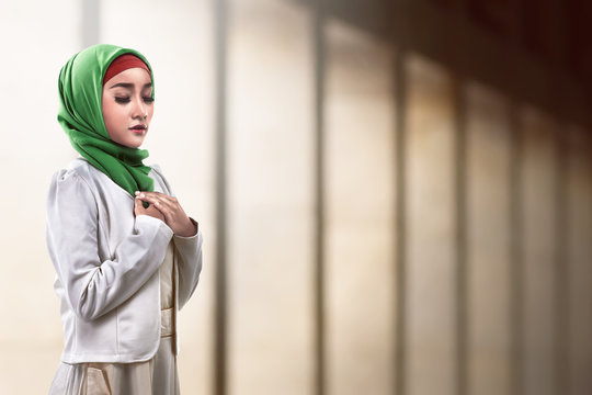 Asian muslim woman praying