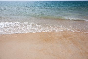 Sea wave blue color on the tropical beach. Thailand coastline