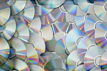 DVD CD disc pile technology background texture pattern photo