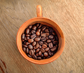 coffee bean in wood cup