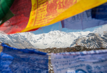 The prayer flag and mount Annapurna I the 10th highest peak of the world in Annapurna conservation area of Nepal.