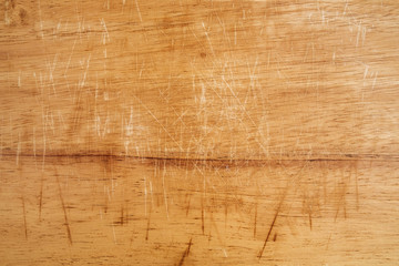 Old scratched wooden chopping board texture