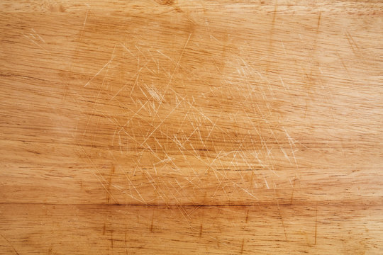 Fototapeta Old scratched wooden chopping board texture