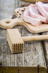 Raw meat on a wooden table