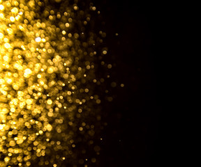 glitter vintage lights background. light gold and black. defocus
