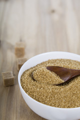 Cane sugar in a white bowl