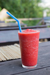 Strawberry smoothie on table