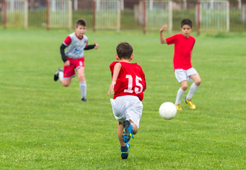  Boys kicking ball