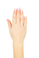 Female hand with manicure on a white background