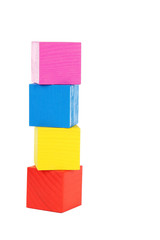Colorful wooden toy cubes isolated on a white